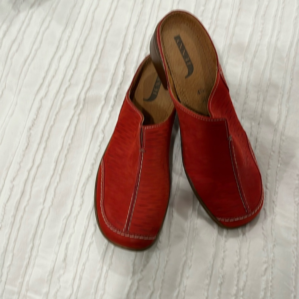 NWOT Size 7. Beautiful red suede slip on. Says 4 1/2 inside, which is Euro.
